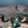 Susan Cardona - Woodstock, New York - Pulling in the fishing nets, Grenada