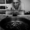 Gili Yaari - Tel Aviv, Israel - Bulgarian born holocaust survivor Yakov Assa sits in the yard of the Shaar Menashe Mental Health Center for Holocaust survivors in Pardes Hanna, Israel on Oct 20, 2010.