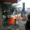 Turjoy Chowdhury - Bangladesh - A local bus Route no 7 crashed into an ATM booth  at	Katabon because another bus collied with this side by side.