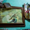 Erin Lee - An image of a devotee to Malverde - also known as the Saint of the Narcos, seen holding a rifle, hangs on the wall of the chapel in the saint’s honour in Culiacán, Sinaloa, Mexico  