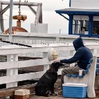 Carl Shubs - Fishing on the Pier with his Dog