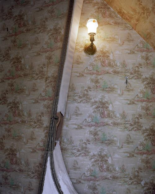 Helen Jones - Train tracks running up a wall