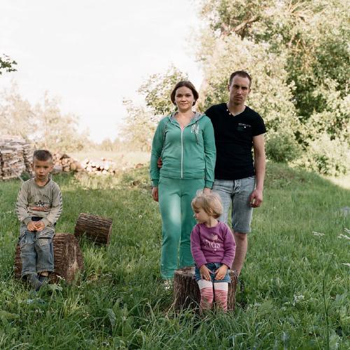 Olga Kulaga - Young family. To provide for the family, father has to look for a job in nearby countries