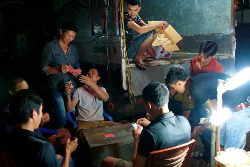 Josh Bergeron  -  Workers on Break at Long Bien Market