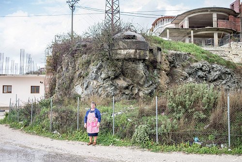 Oleksandr Rupeta - Shopkeeper stands under the bunker, Mesopotam, Albania